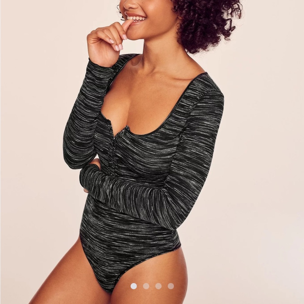 Adore Me Havyn long-sleeve bodysuit in black/grey space-dye knit fabric with fun